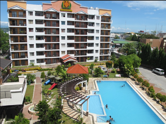 Magallanes Residences exterior with pool